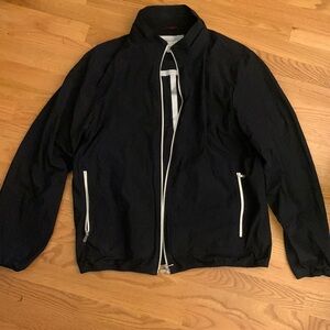 Brunello Cucinelli designer zip-up windbreaker. Dark navy with white detailing.